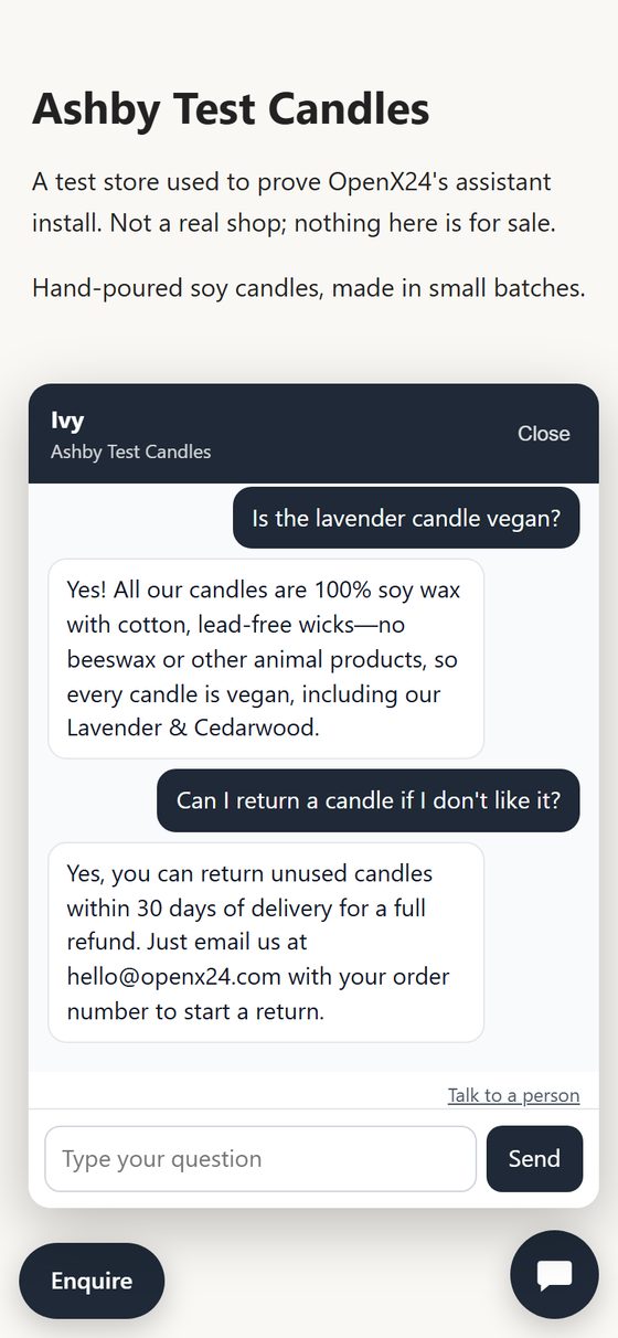 The test store on a phone, with its assistant confirming the lavender candle is vegan soy wax and explaining the 30-day return for unused candles